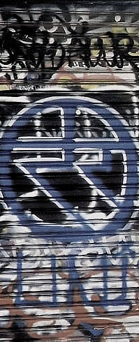 Original unity symbol graffiti seen photographed at The Venice Strand (Ocean Front walk) in Venice Beach, CA (1991)